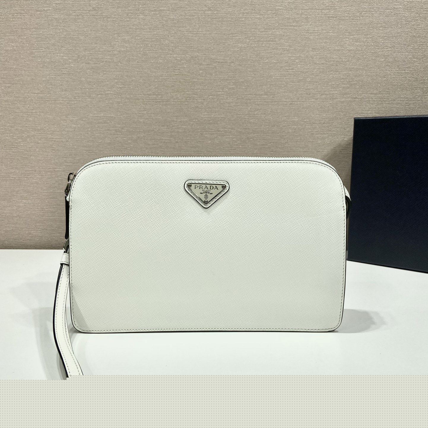Pra*a clutch bags